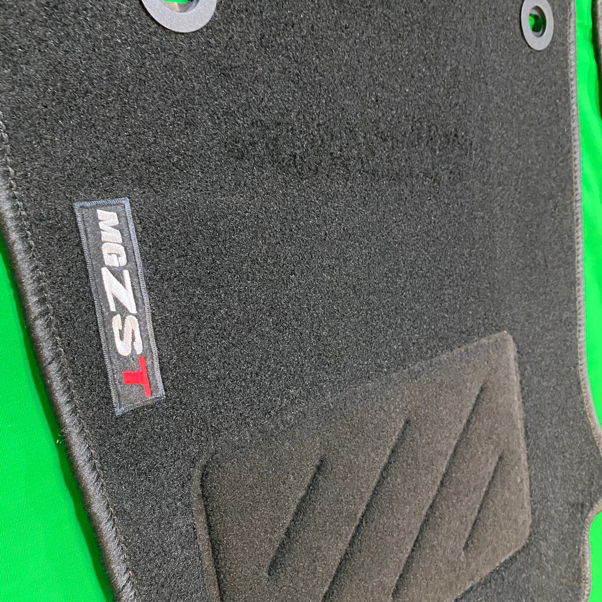 MG ZST Genuine Carpet Floor Mats - Black With Logo | ARG Parts & Accessories.